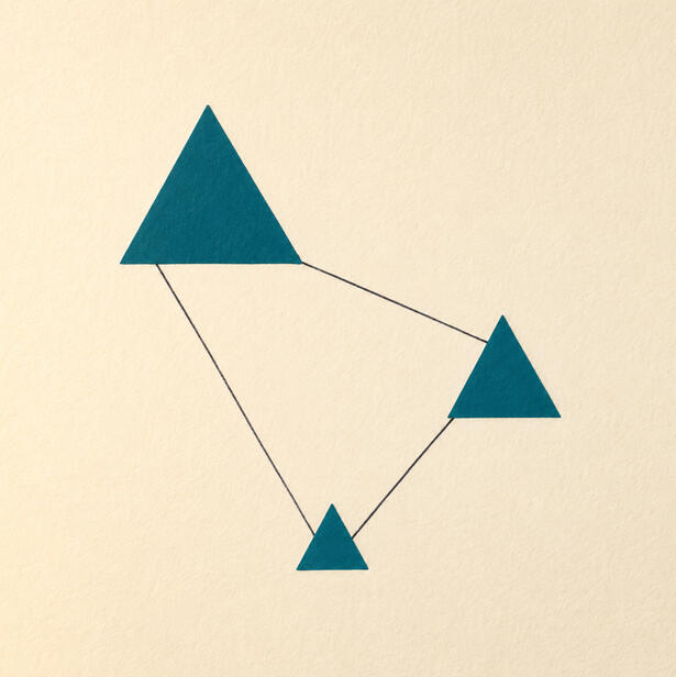 System design Three deep teal triangles of different sizes connected by fine hand-drawn lines on warm cream paper, forming a small system diagram.
